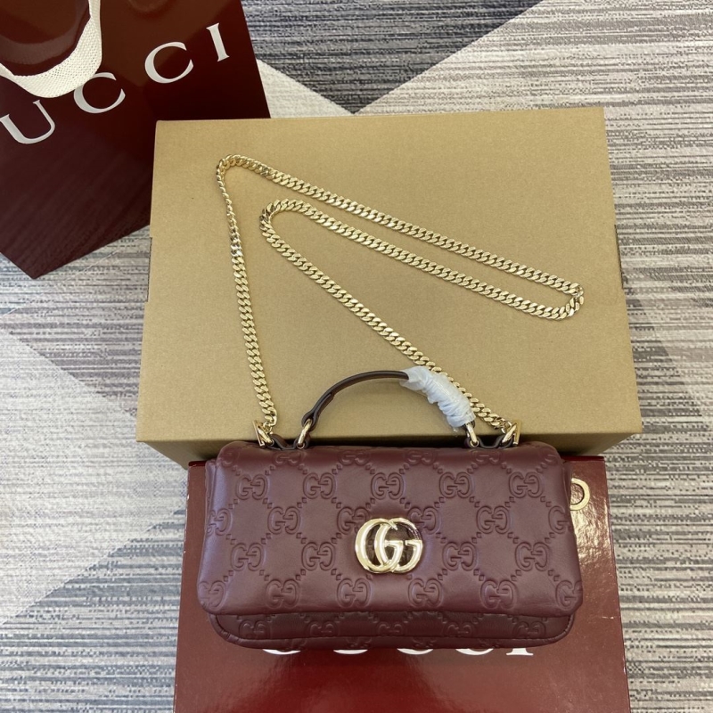 G*u*i top handle bags